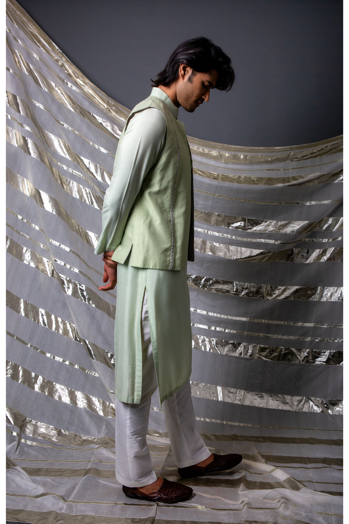 Green bandi jacket paired with long kurta and pyjama pants - Kunal Anil Tanna