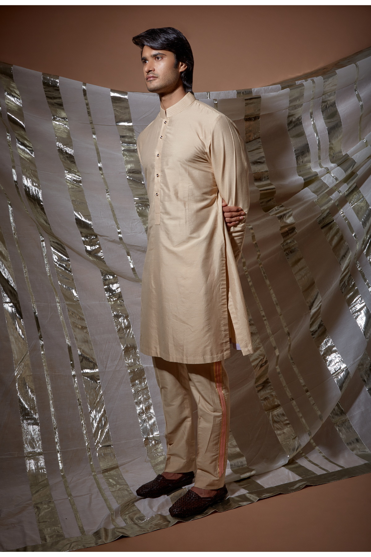 Beige zari textured bandi jacket with peach detail paired with kurta and pyjama pants - Kunal Anil Tanna