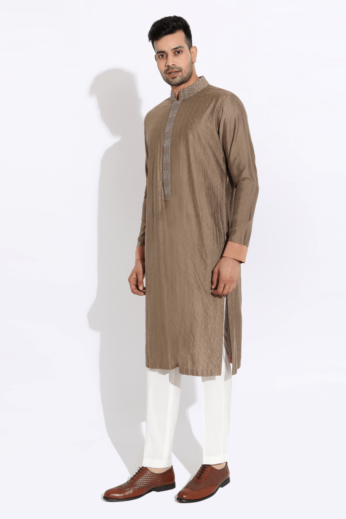 Beige textured kurta with salmon cuff and finish and  pyjama - Kunal Anil Tanna